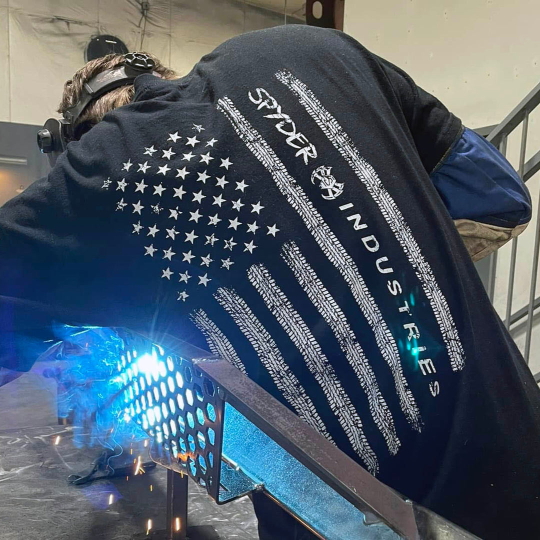 Flag tee on welder